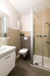 Koupelna v ubytování Meerblick pur – Wohnung Strandhafer am Südstrand