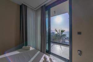 Ένα ή περισσότερα κρεβάτια σε δωμάτιο στο Villa Atlantic Private Pool