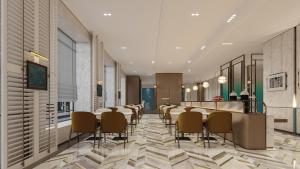a conference room with a long table and chairs at Holiday Inn Express Harbin Central Avenue by IHG in Harbin