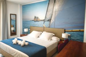 Postel nebo postele na pokoji v ubytování Hotel Sol Almería