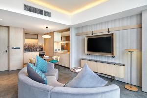 TV a/nebo společenská místnost v ubytování VIVERE Hotel, ARTOTEL Curated