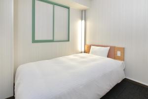 Letto o letti in una camera di washington R&B Hotel Kanazawa Station Nishiguchi