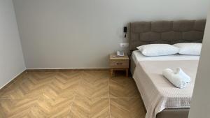 Postel nebo postele na pokoji v ubytování Hotel Parid
