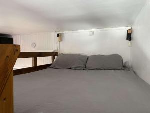 Ένα ή περισσότερα κρεβάτια σε δωμάτιο στο Très beau studio avec mezzanine