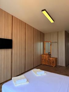 Letto o letti in una camera di Comfortium