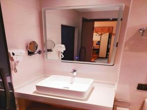 Ένα μπάνιο στο GreenTree Inn Lu'an Jin'an District Yuanda Xingfuli +164 φωτογραφίες