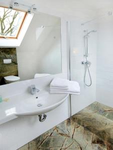 Koupelna v ubytování Grottger Luxury Boutique Hotel City