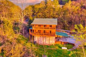 an aerial view of a house in the woods at Natures Hideaway in Sevierville