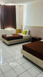 Posezení v ubytování Hotel Huswah Airport