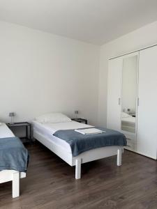 Postel nebo postele na pokoji v ubytování Apartments Markov Murter