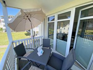 Μπαλκόνι ή βεράντα στο Haus Rügenscher Bodden Whg 06 mit Meerblick