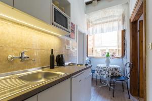 Кухня или кухненски бокс в Apartments Rudjer