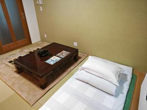 Postel nebo postele na pokoji v ubytování White House Guesthouse