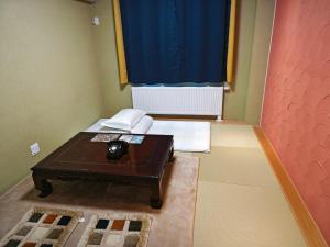 Postel nebo postele na pokoji v ubytování White House Guesthouse
