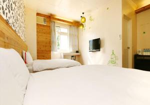 TV o dispositivi per l'intrattenimento presso Cocos Hot Spring Hotel