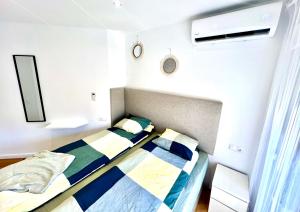 Ein Bett oder Betten in einem Zimmer der Unterkunft Apartamento Centro Torremolinos
