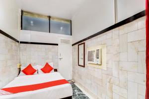 Postel nebo postele na pokoji v ubytování OYO Hotel Dreamland