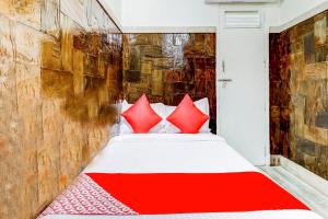 Postel nebo postele na pokoji v ubytování OYO Hotel Dreamland