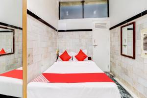 Postel nebo postele na pokoji v ubytování OYO Hotel Dreamland