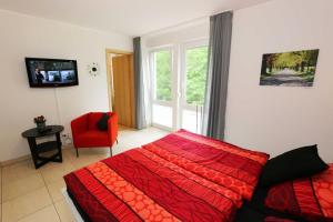 TV/Unterhaltungsangebot in der Unterkunft Villa Salus Whg 5 Auszeit - mit 2 Bädern und Balkon