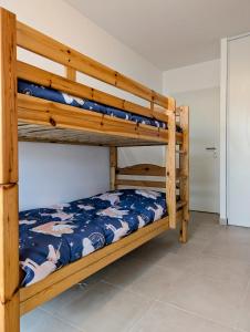 Postel nebo postele na pokoji v ubytování Bel appartement, jardin et terrasse , à 800 mètres du port de Pornic