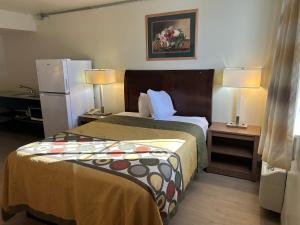 Ένα ή περισσότερα κρεβάτια σε δωμάτιο στο Studio Apartments