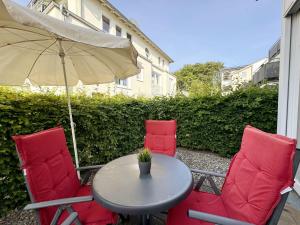Ein Patio oder anderer Außenbereich in der Unterkunft Haus Möwe I Whg 02 mit Terrasse
