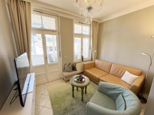 Μια τηλεόραση ή/και κέντρο ψυχαγωγίας στο Villa Minna Whg 06 mit Balkon