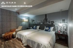Postel nebo postele na pokoji v ubytování CU Hotel Kaohsiung