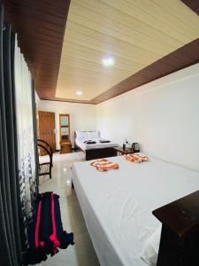 Postel nebo postele na pokoji v ubytování Sunset view Homestay Sigiriya