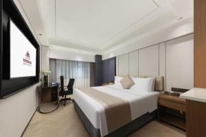 Μια τηλεόραση ή/και κέντρο ψυχαγωγίας στο Xiamen Jin Rui Jia Tai Hotel