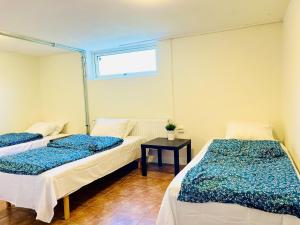 Ένα ή περισσότερα κρεβάτια σε δωμάτιο στο Cozy 3 rooms apartment with 7 bed in Landskrona