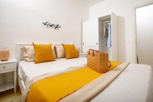 Ένα ή περισσότερα κρεβάτια σε δωμάτιο στο BILANCIA'S HOUSE III 30'Porto cervo & SEA VIEW