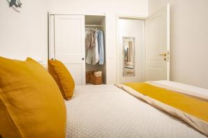 Ένα ή περισσότερα κρεβάτια σε δωμάτιο στο BILANCIA'S HOUSE III 30'Porto cervo & SEA VIEW