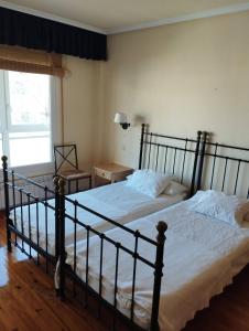 Ένα ή περισσότερα κρεβάτια σε δωμάτιο στο Apartamento a 130 metros de la playa Parking
