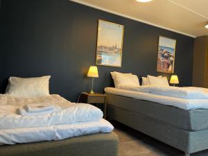 Voodi või voodid majutusasutuse Hotell Villa Solviken toas