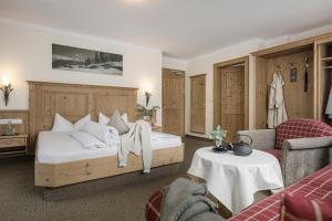 Postel nebo postele na pokoji v ubytování Hotel Lenz