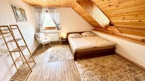 Postel nebo postele na pokoji v ubytování Apartmán Domanín 124