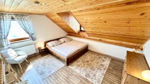 Postel nebo postele na pokoji v ubytování Apartmán Domanín 124