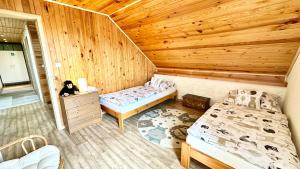 Postel nebo postele na pokoji v ubytování Apartmán Domanín 124