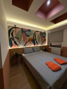 Postel nebo postele na pokoji v ubytování Bloom Boutique Hotel