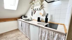 Kuchyň nebo kuchyňský kout v ubytování Apartmán Domanín 124 + 22 fotografií