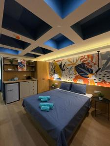 Postel nebo postele na pokoji v ubytování Bloom Boutique Hotel