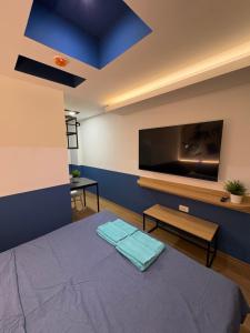 Postel nebo postele na pokoji v ubytování Bloom Boutique Hotel