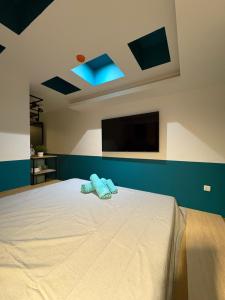 Postel nebo postele na pokoji v ubytování Bloom Boutique Hotel
