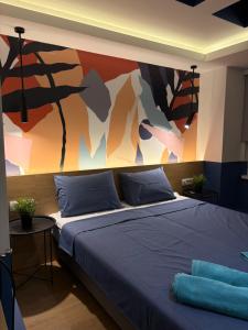 Postel nebo postele na pokoji v ubytování Bloom Boutique Hotel