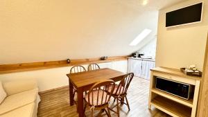 Kuchyň nebo kuchyňský kout v ubytování Apartmán Domanín 124