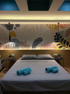 Postel nebo postele na pokoji v ubytování Bloom Boutique Hotel