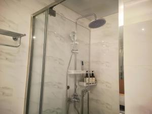 Koupelna v ubytování Suyi Hotel Apartment