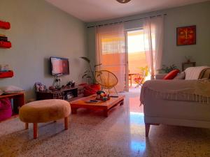 TV a/nebo společenská místnost v ubytování Boho Hostel
